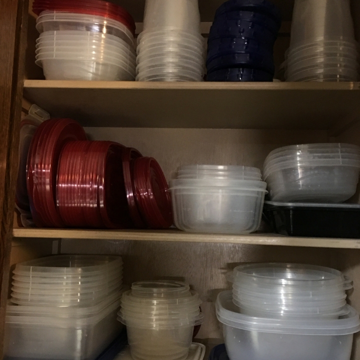 organized tupperware cabinet