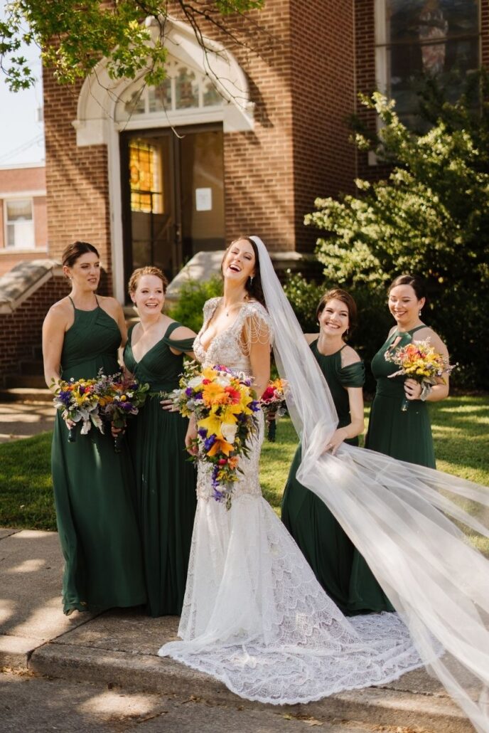 laughing wedding bridal party