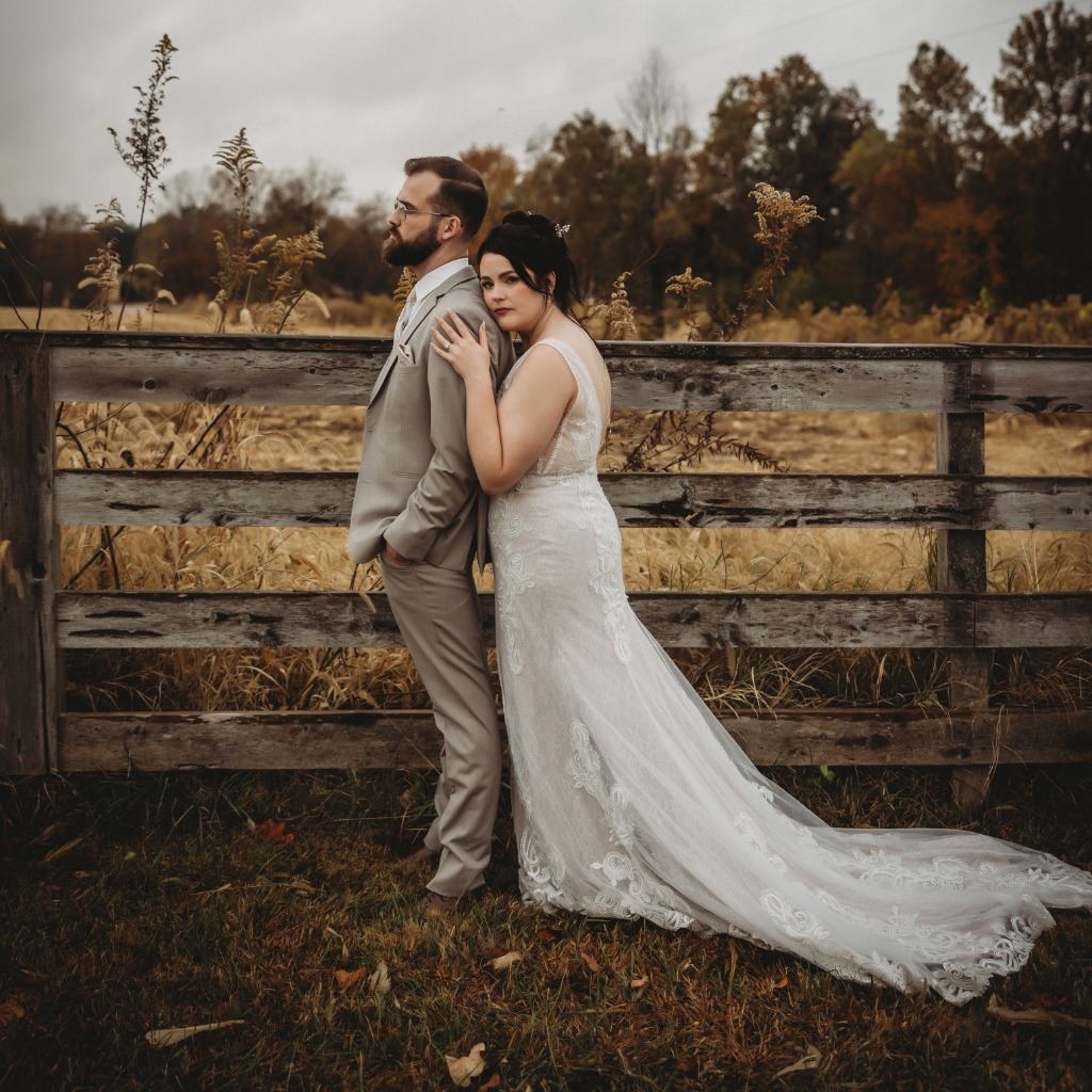 bride and groom in dark colors at farmer and frenchman
